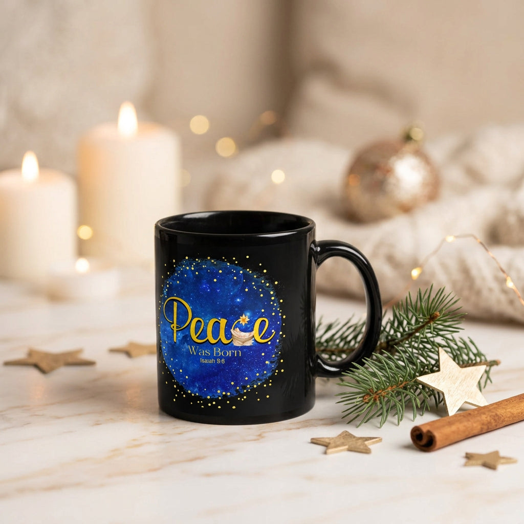 Black Peace Was Born Isaiah 9:6 mug surrounded by evergreen branches, gold stars, cinnamon and candles, handle on the right