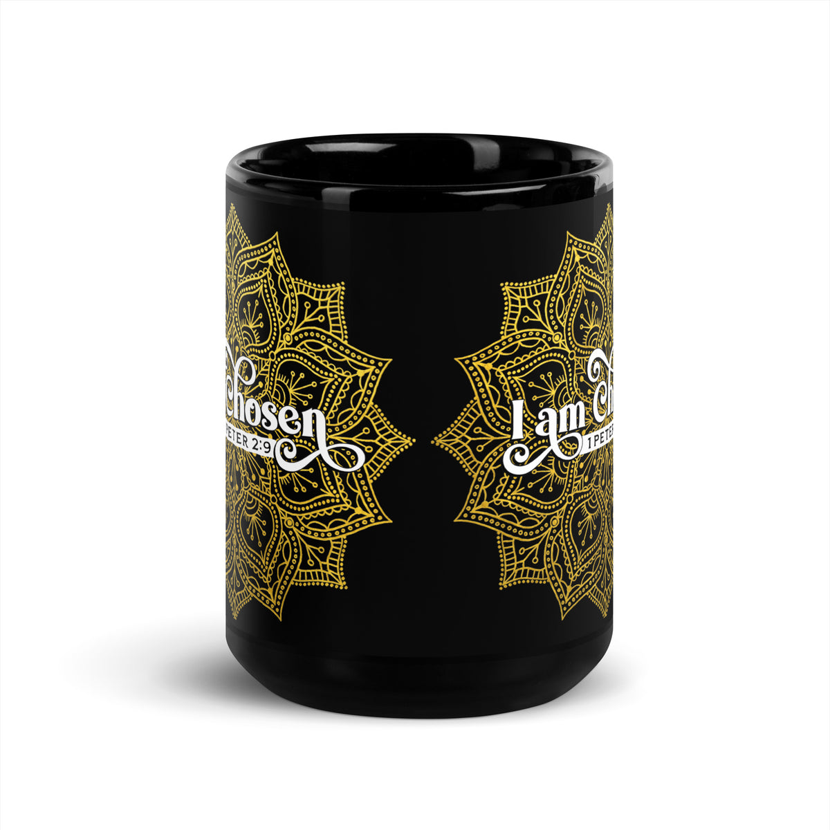 Angled view of a black I Am Chosen 1 Peter 2:9 mug with gold-colored pattern, handle on right