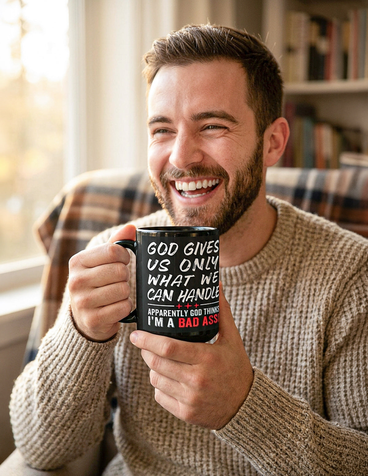 man laughing and holding Black 15 oz mug God Gives Us Only What We Can Handle with handle on left