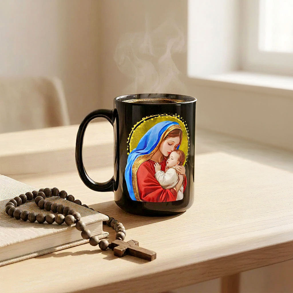 Steaming black Mary and Jesus mug on a sunlit table beside a rosary, book