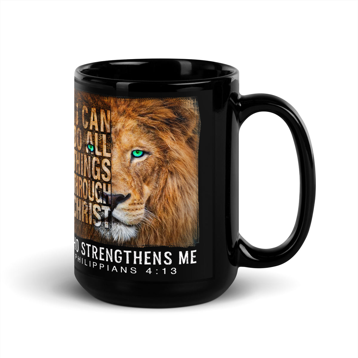 Angled view of a black Philippians 4:13 mug with lion artwork, handle on right