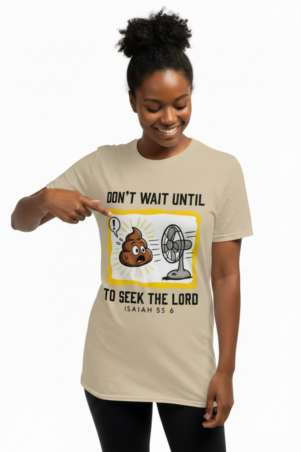  Woman pointing to the poop-and-fan design on a Sand Isaiah 55:6 Christian T-shirt