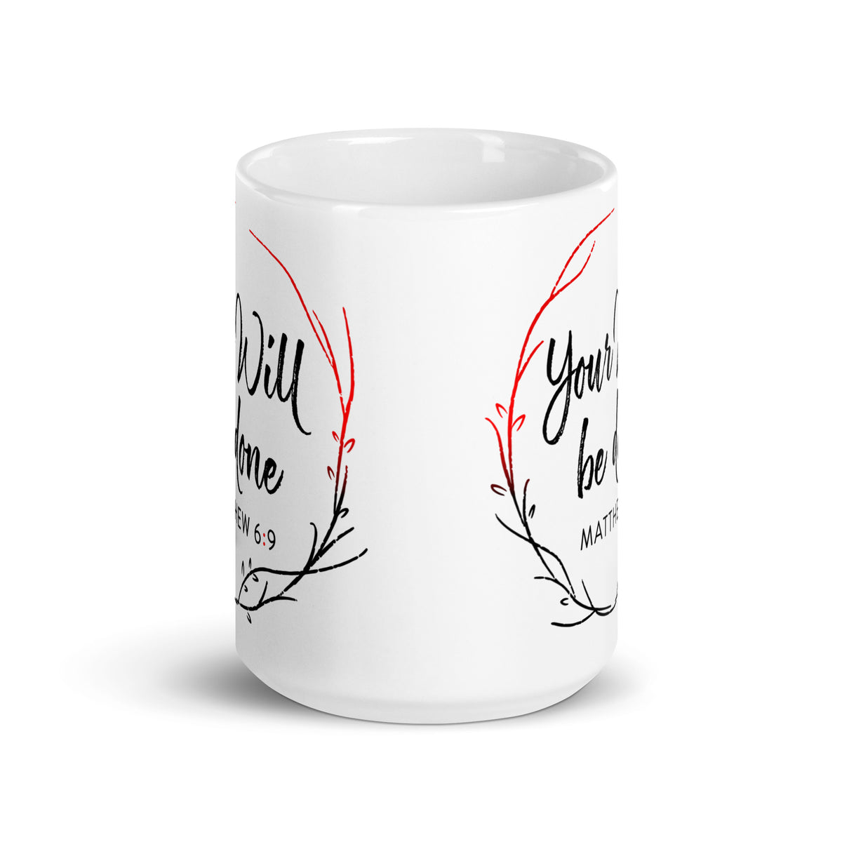 Side view of a white Your Will Be Done mug showing the edges of the wreath designs