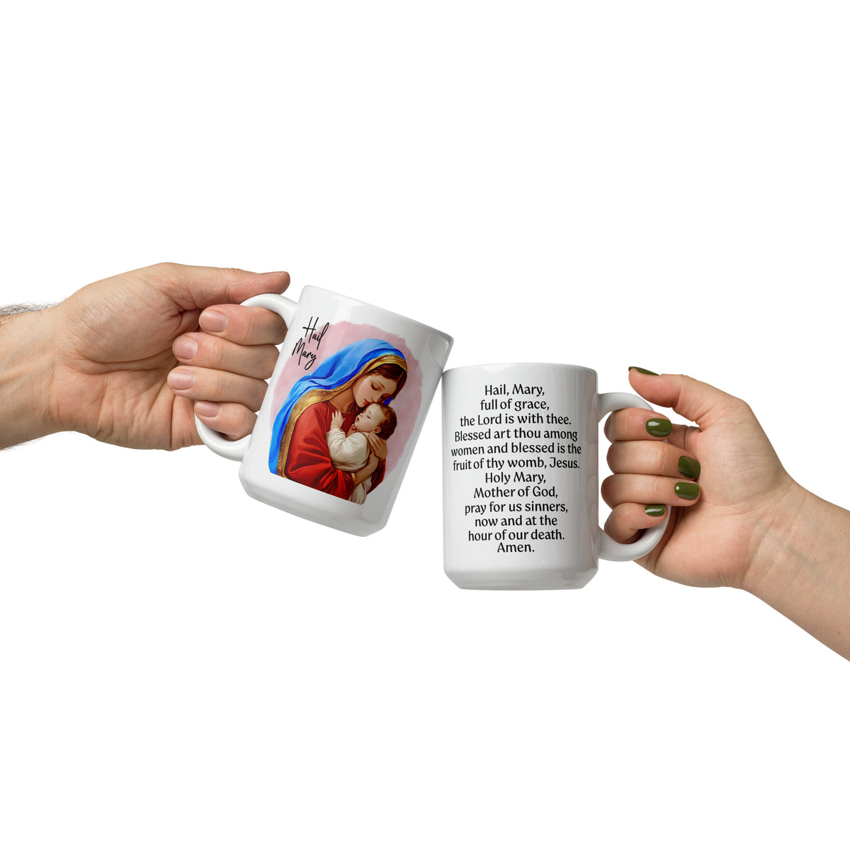 Two white mugs held together, showing Mary holding Jesus on one and the Hail Mary prayer on the other