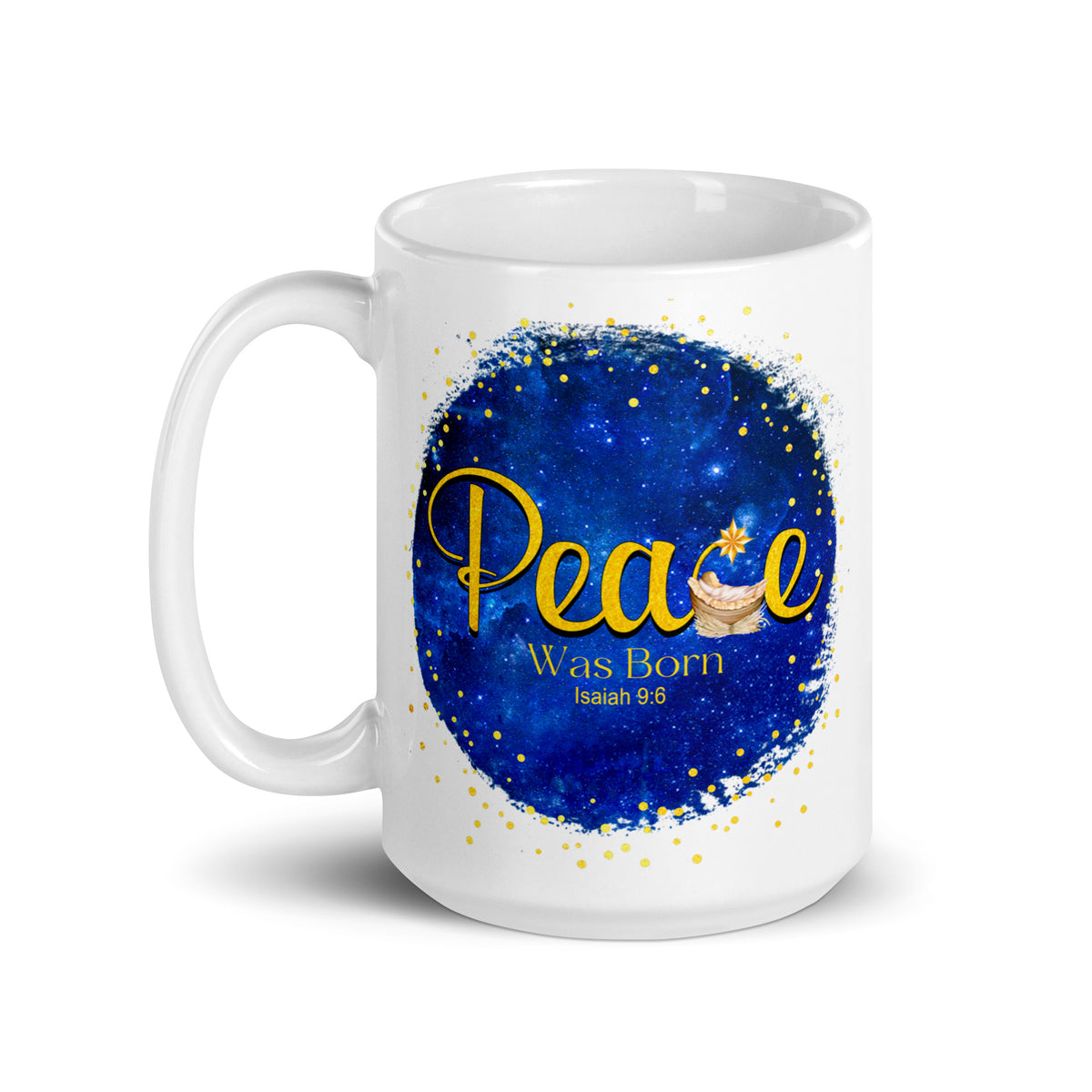 White glossy mug with gold Peace Was Born Isaiah 9:6 lettering, a manger and star on a blue background, handle on the left