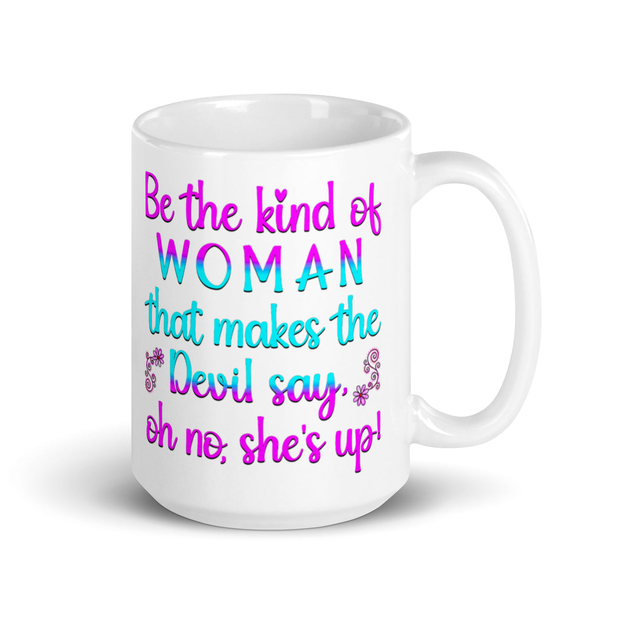 White 15 oz mug with Be the Kind of Woman message in pink and teal, handle on right