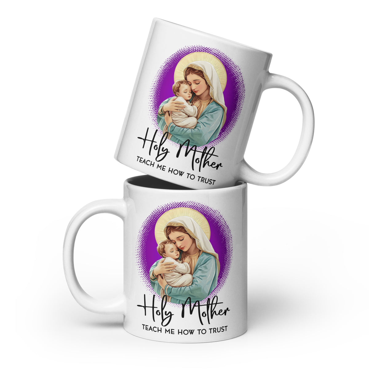 Two stacked white mugs displaying Mary holding Jesus and Holy Mother Teach Me How to Trust lettering