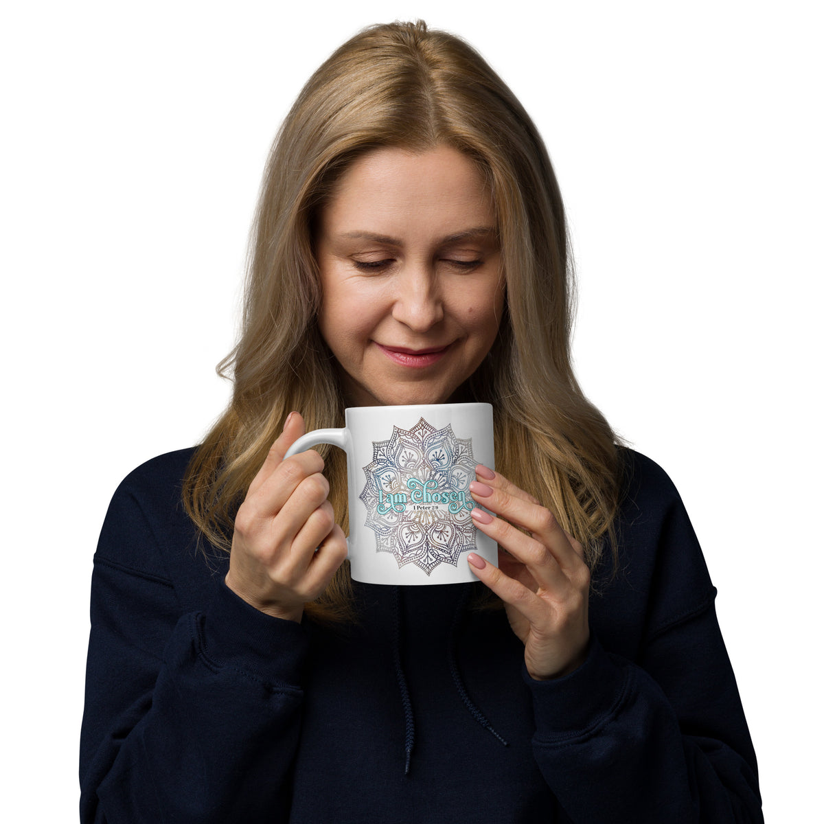 A woman holding White glossy 20 oz mug with the I Am Chosen 1 Peter 2:9 design, handle on the left